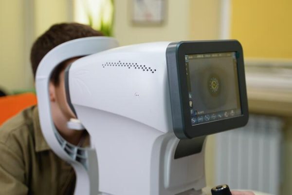 patient-undergoing-eye-examination-with-autorefractor-in-ophthalmology-clinic-video